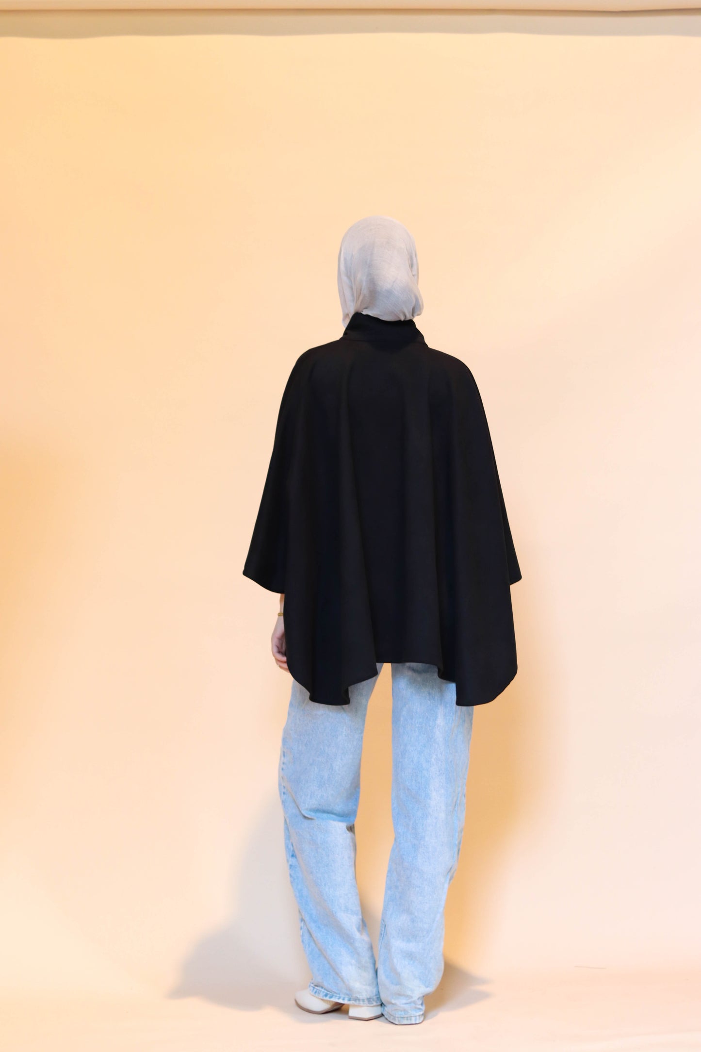 Suede scarf poncho in Black