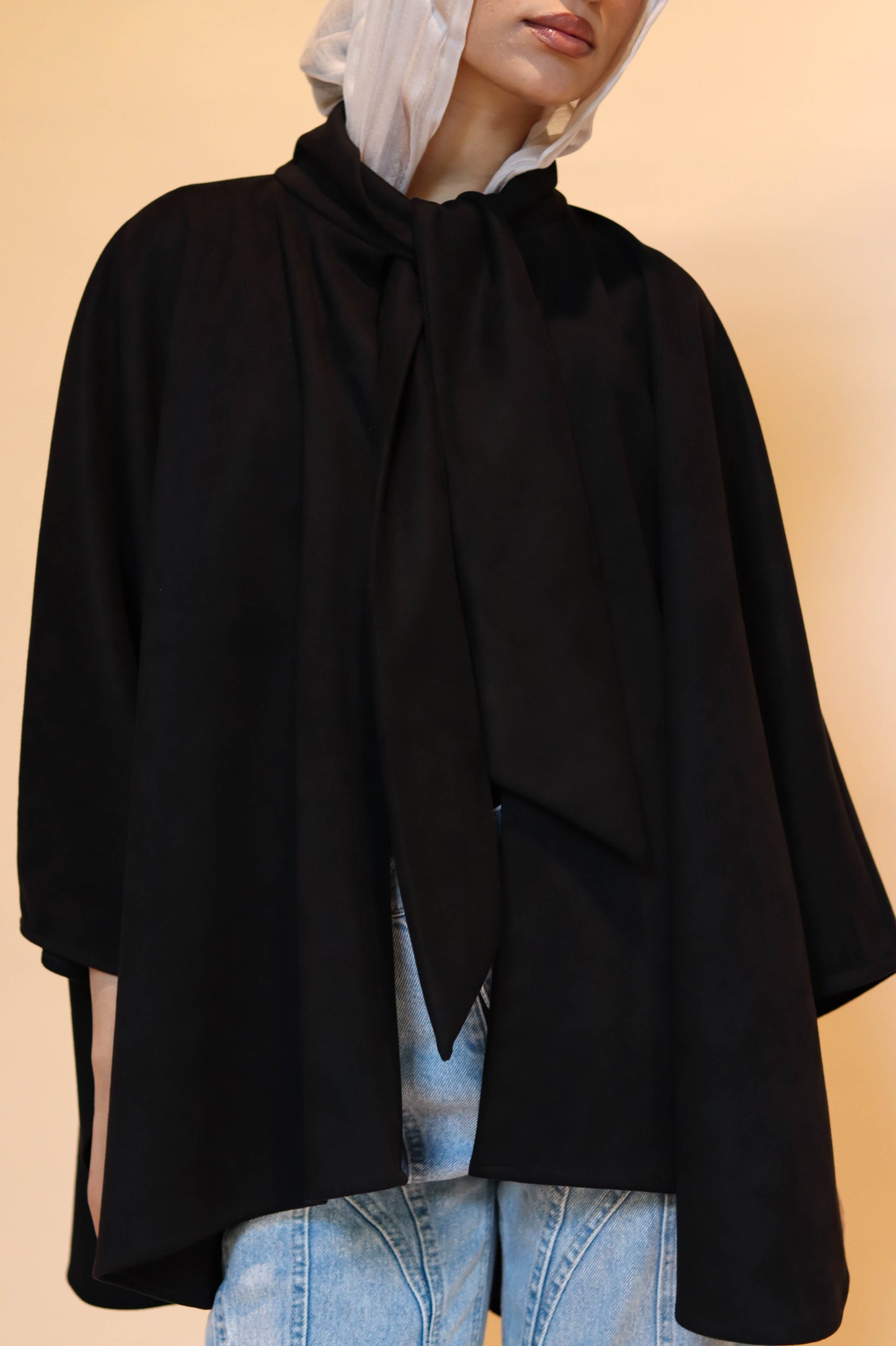 Suede scarf poncho in Black